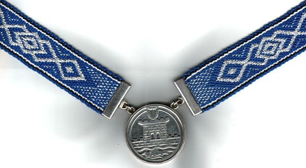 mit Medaille